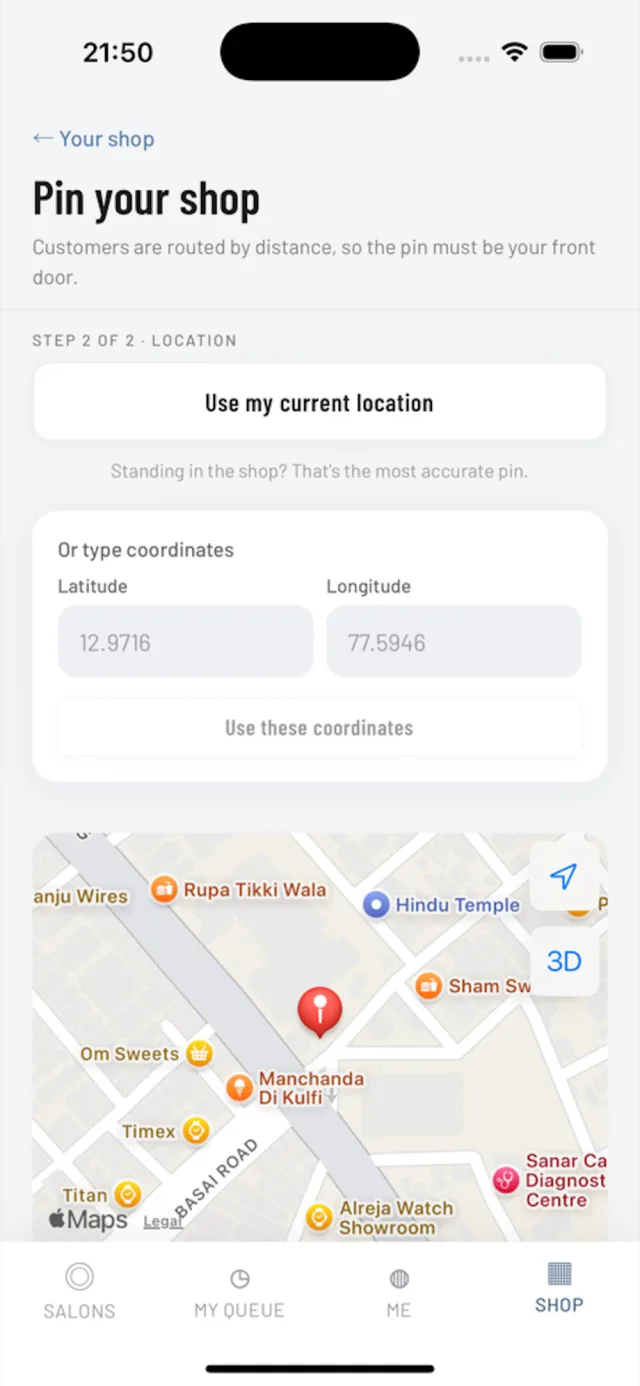 OnQ on iPhone: a shop owner pinning the shop's location so customers are routed to the front door