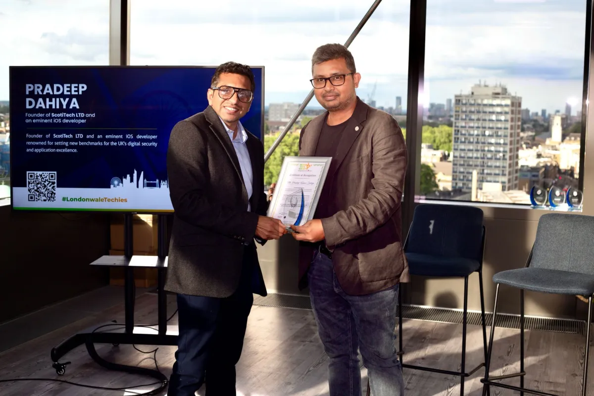 Pradeep Dahiya receiving a certificate of recognition from the Indian Tech Society